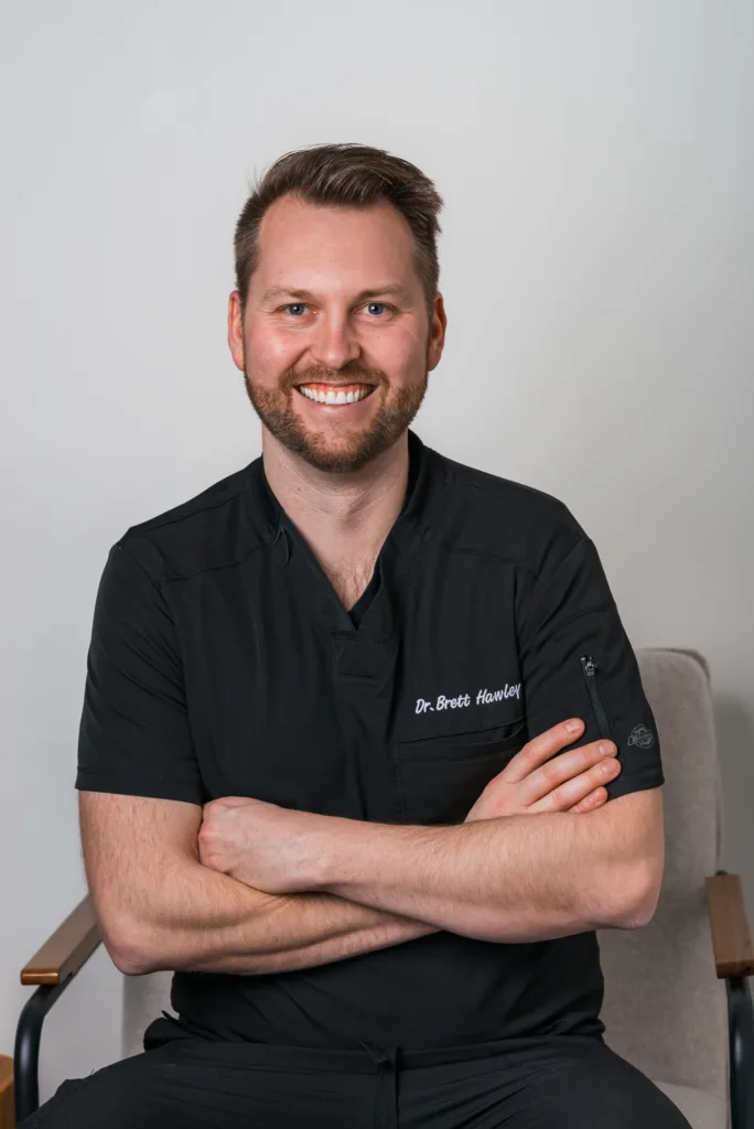 Dr. Brett Hawley, dentist and owner of Panorama Dental Care in Kanata, smiling warmly.